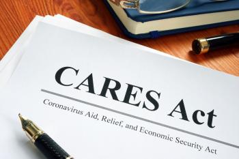 "CARES Act" document with pen