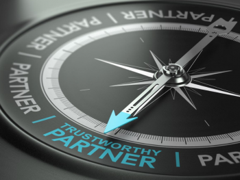 compass with arrow pointing to "trustworthy partner"