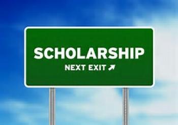 Road sign that says "Scholarship Next Exit"