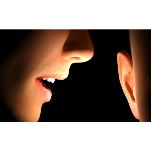 image showing person whispering into someone's ear