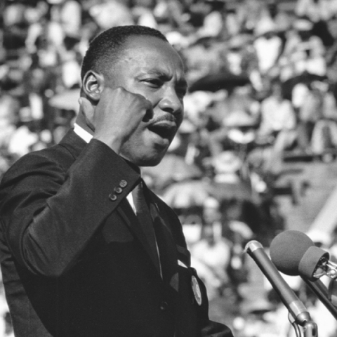 Martin Luther King Jr. given a speech for a large crowd