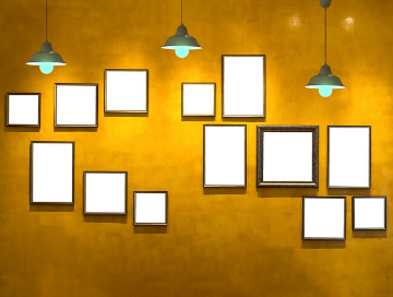 image of empty frames hanging on wall