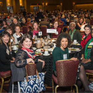 Photo of Girl Scouts sponsor table of attendees