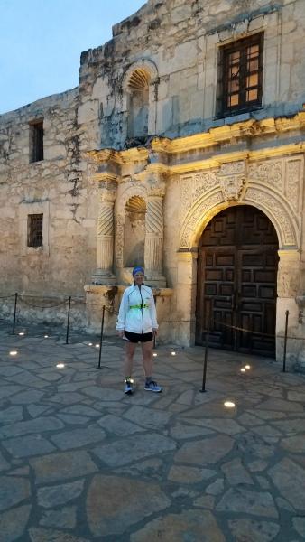 Photo of Amy Rowell in front of The Alamo near San Antonio, Texas