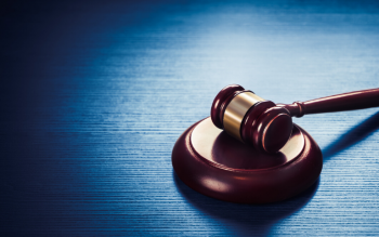 image of gavel on a desk