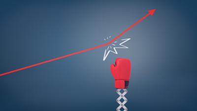 Boxing glove hitting data line on chart