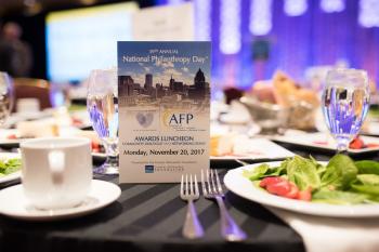 image of 2017 program upright on luncheon table set for NPD