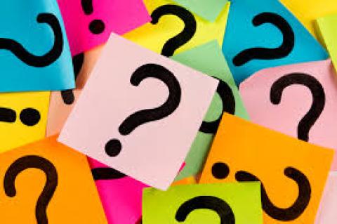 Multicolor boxes filled with question marks