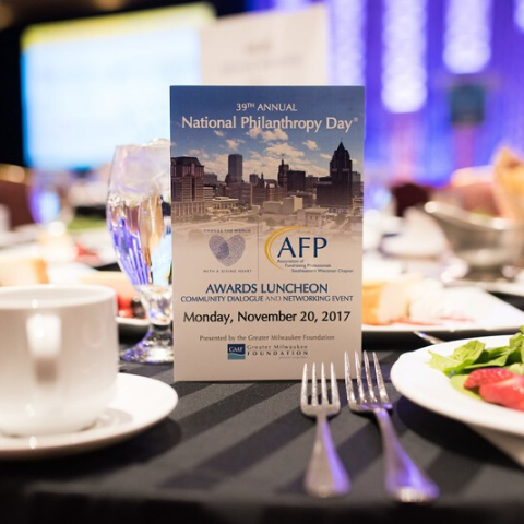 image of 2017 program upright on luncheon table set for NPD