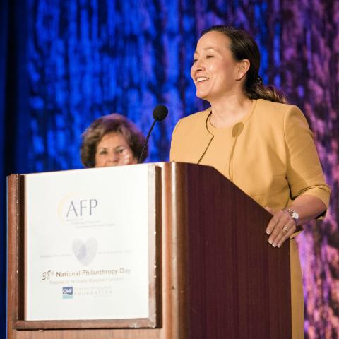 Image of Aurora nominator at podium speaking during NPD 2016 event