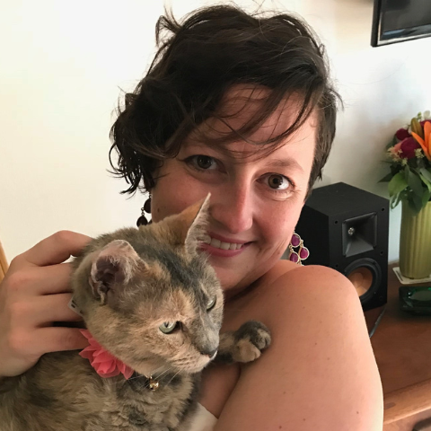 Image of Rikki Starich holding her pet cat