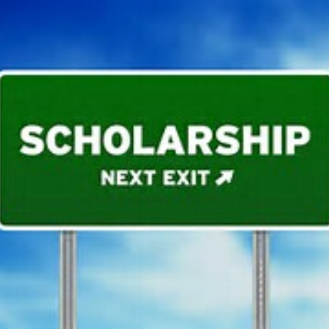 Road sign that says "Scholarship Next Exit"