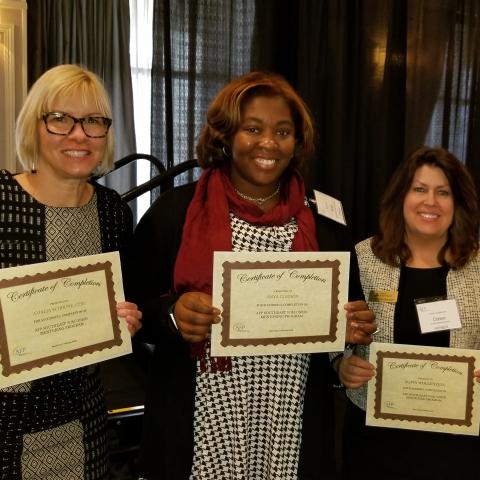 AFP mentoring program graduates posing for photo holding their certificates